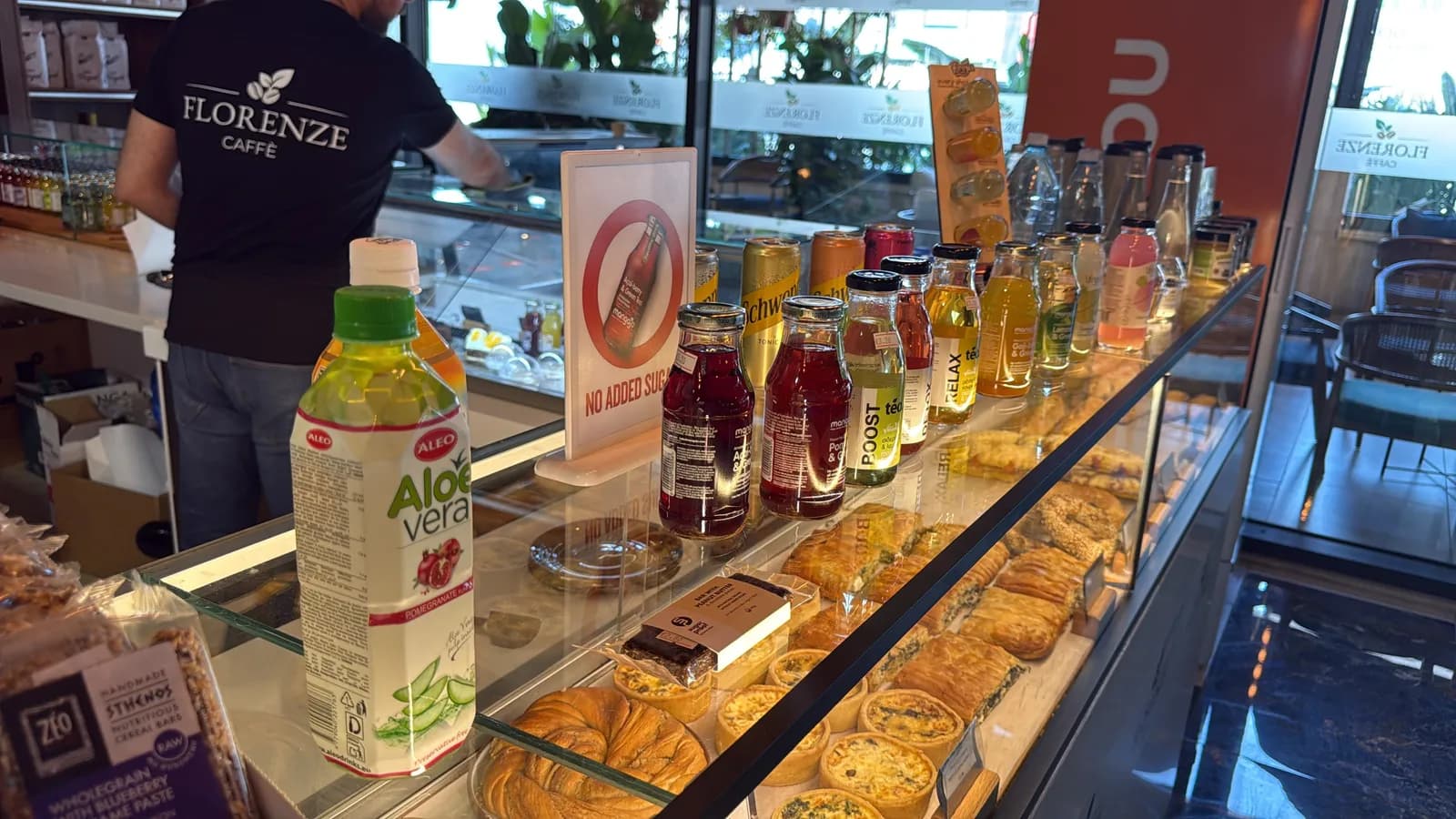 Fresh pastries, quiches and cold drinks on the deli counter
